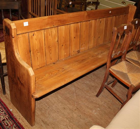 Pine pew with boarded back